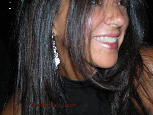 Date this charming Brazil girl Regina from  B1946